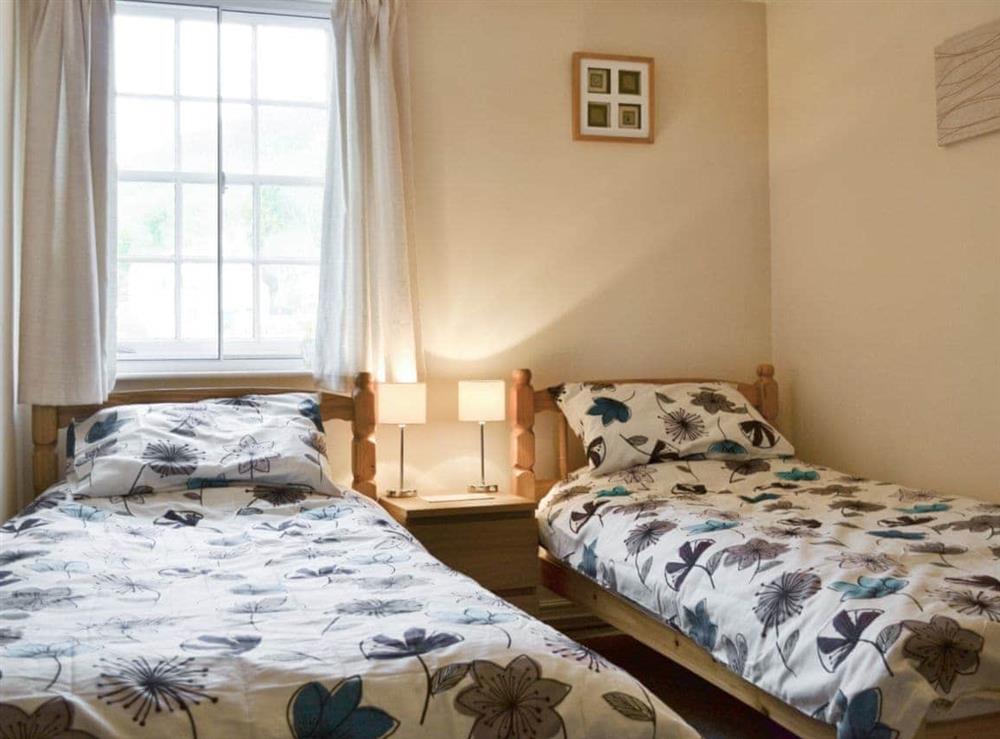 Twin bedroom at Mill Pond Cottage in Cromford, Derbyshire