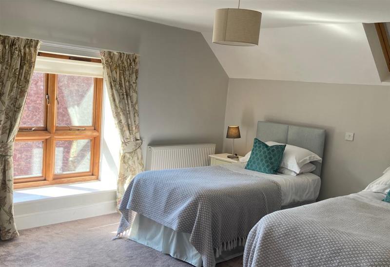 This is a bedroom at Mill Pond Cottage, Williton