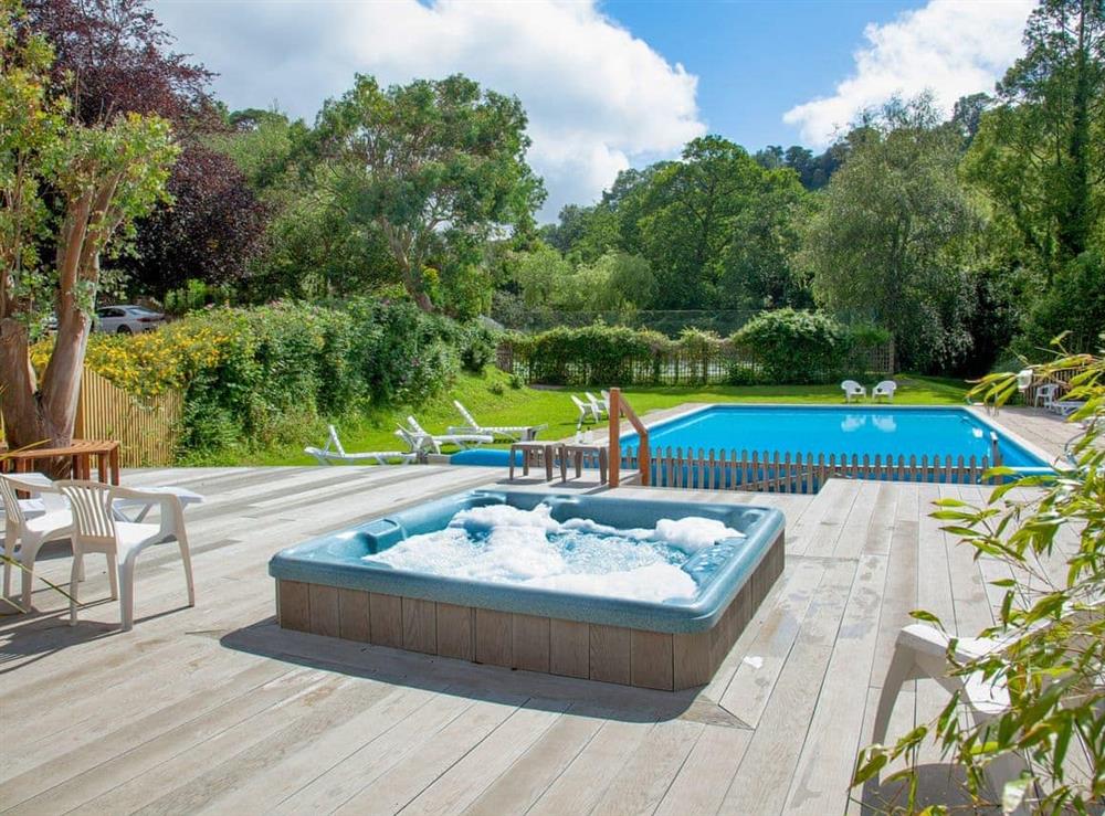 Outdoor hot tub at Mill Spring in Bow Creek, Nr Totnes, South Devon., Great Britain