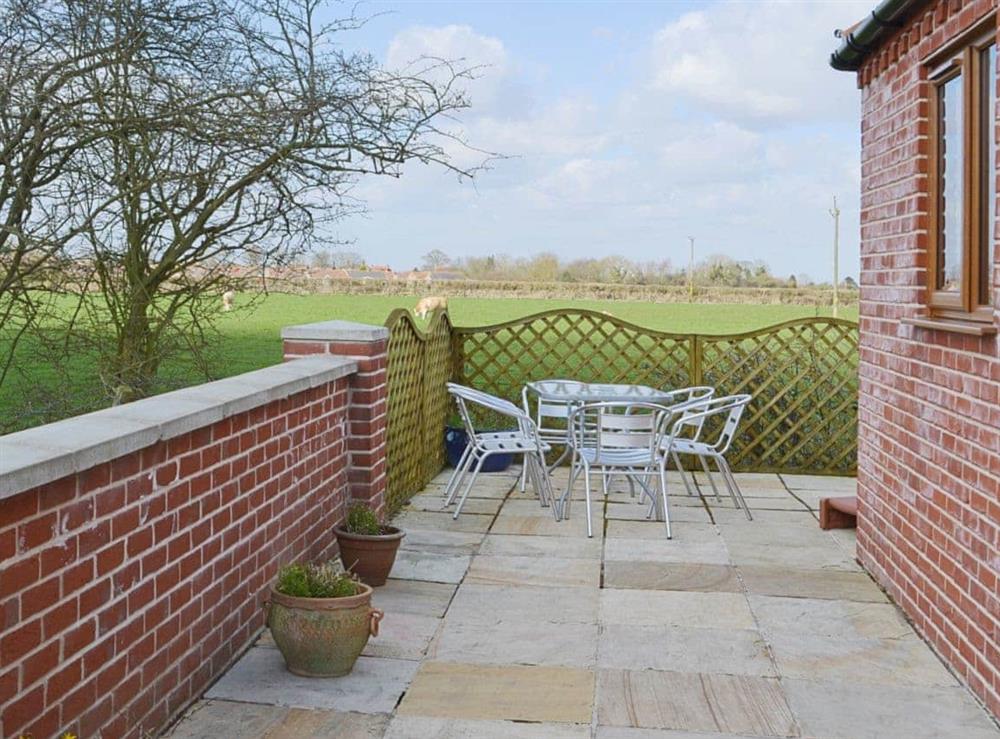 Sitting-out-area (photo 2) at Mill Stone Cottage in Nr. Chapel St Leonards, Lincolnshire