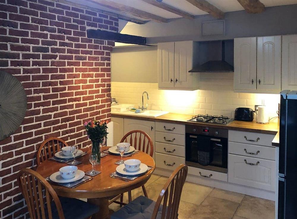 Lovely kitchen with dining area at Mill Stone Cottage in Wolsingham, near Stanhope, Durham