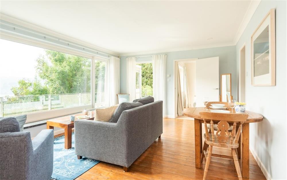 The apartment living space-with views over Millbay at Millbay Cottage in East Portlemouth
