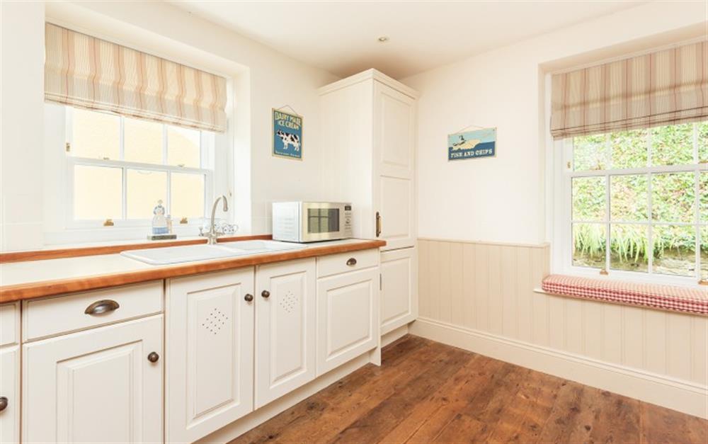 The kitchen is light and bright at Millbay Cottage in East Portlemouth
