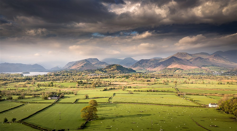 An aerial view of the Derwent fells with Derwentwater and Derwent Isle to the left, near Millbeck Towers, Cumbria at Millbeck Towers in Keswick, Cumbria