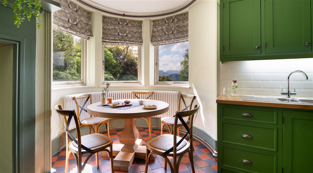 The breakfast table in the kitchen at Millbeck Towers in Keswick, Cumbria