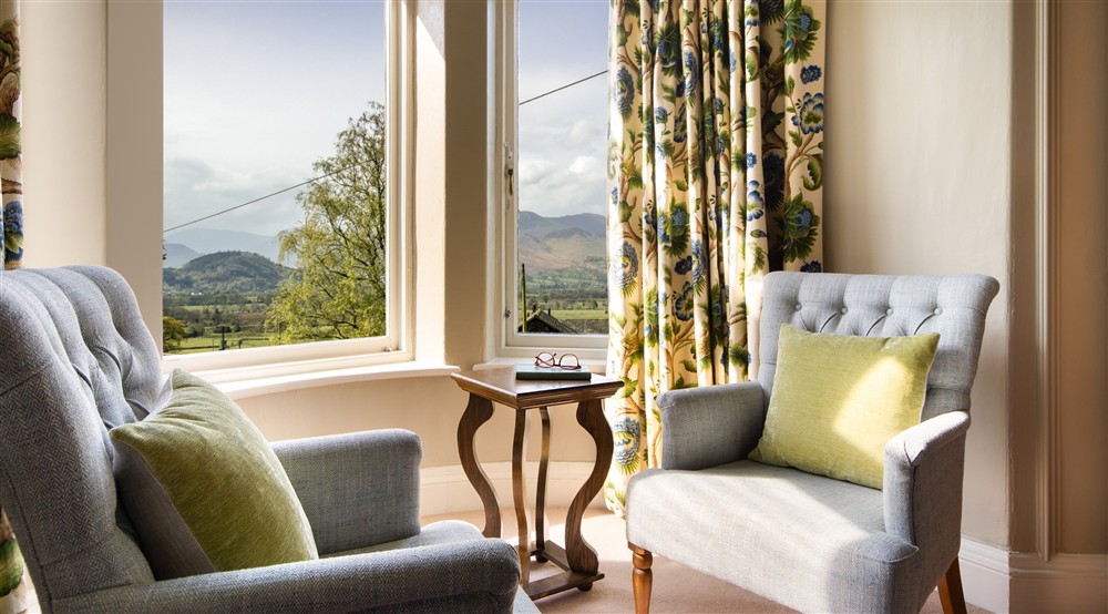 The view towards the Derwent Fells from the turret window of the first floor double bedroom at Millbeck Towers in Keswick, Cumbria