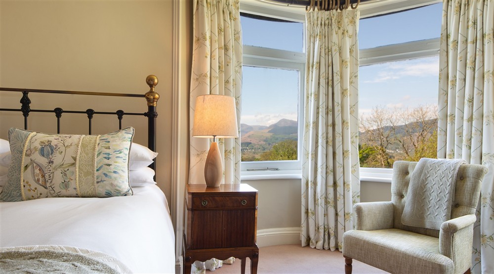 The view towards the Derwent Fells from the turret windows in one of the double bedrooms on the second floor at Millbeck Towers in Keswick, Cumbria