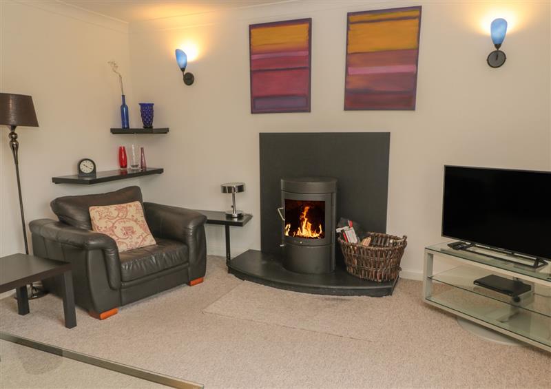 Relax in the living area at Millennium Cottage, Embleton