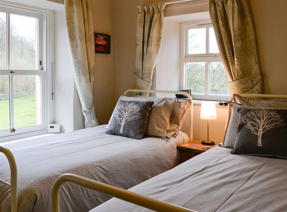 Twin bedroom at Miller Cottage in Scalegill, near Kirkby Malham, North Yorkshire