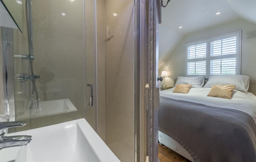 Double bedroom with 6’ bed (which can be 2 x 3’ beds) with en-suite shower room (photo 4) at Millers Loft, Erpingham
