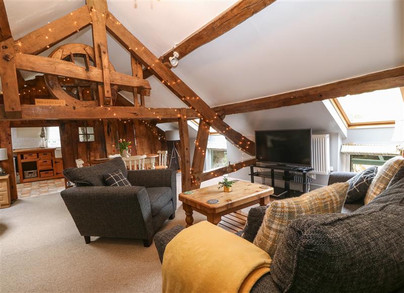 Relax in the living area at Millers Loft, Llanrwst