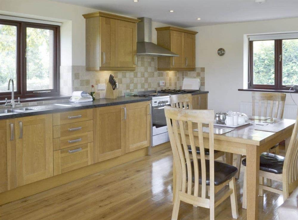 Well-equipped fitted kitchen at Millers Rest in Poundstock, Bude, Cornwall
