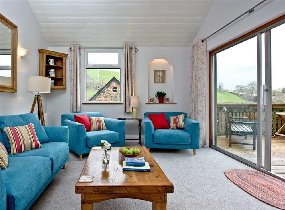Relaxing living area at Miller’s Thumb in Bow Creek, Nr Totnes, South Devon., Great Britain