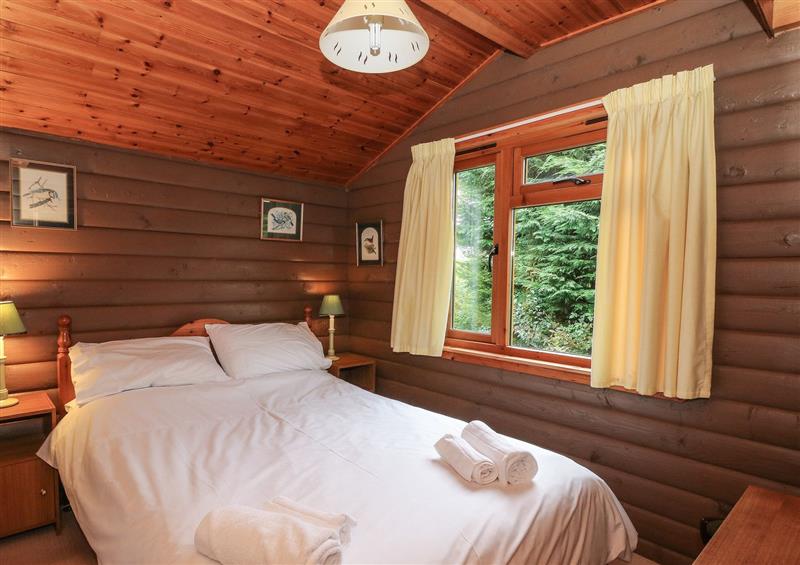 A bedroom in Millmore Cabin (photo 2) at Millmore Cabin, Killin