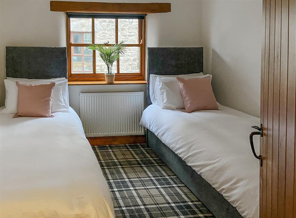 Twin bedroom at Millside in Helsington, Cumbria