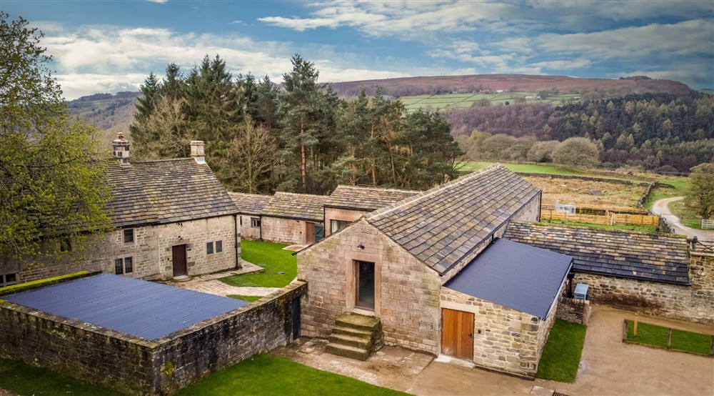 The exterior of Wilson Farmhouse, Millstone Barn and Gorsey Bank Barn, Derbyshire at Millstone Barn in Hope Valley, Derbyshire