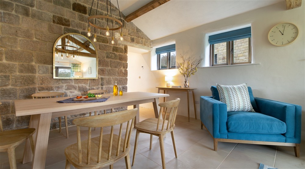 The sitting and dining room (photo 2) at Millstone Barn in Hope Valley, Derbyshire