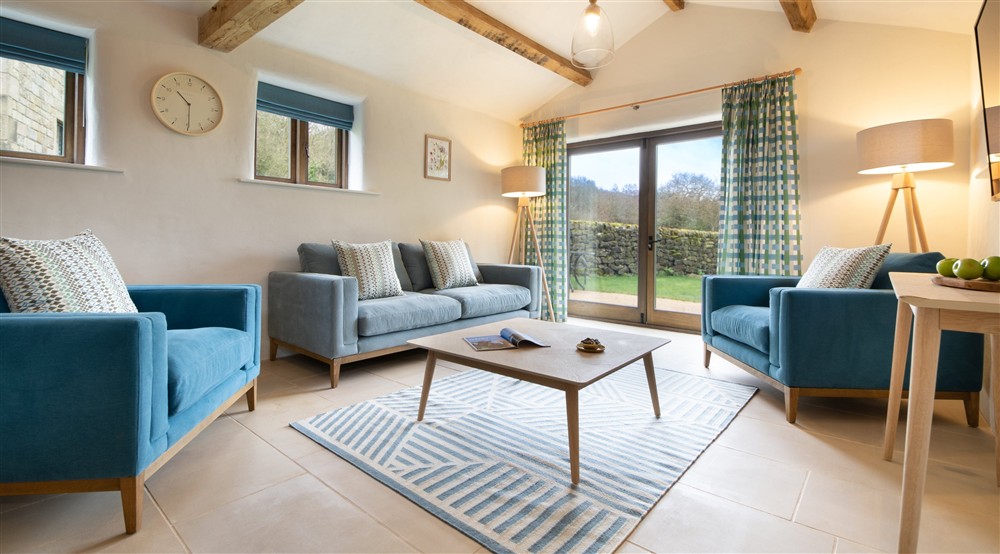 The sitting and dining room at Millstone Barn in Hope Valley, Derbyshire