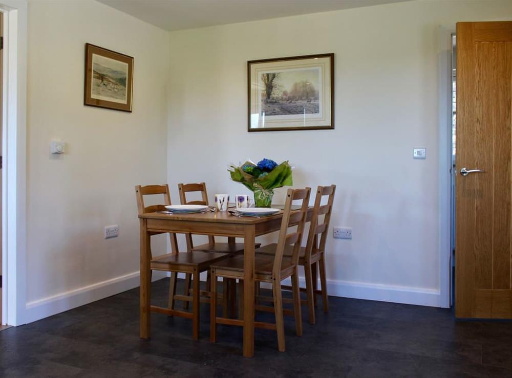 Kitchen and dining room with convenient dining area at Millstone Barn in Priddy, near Wells, Somerset