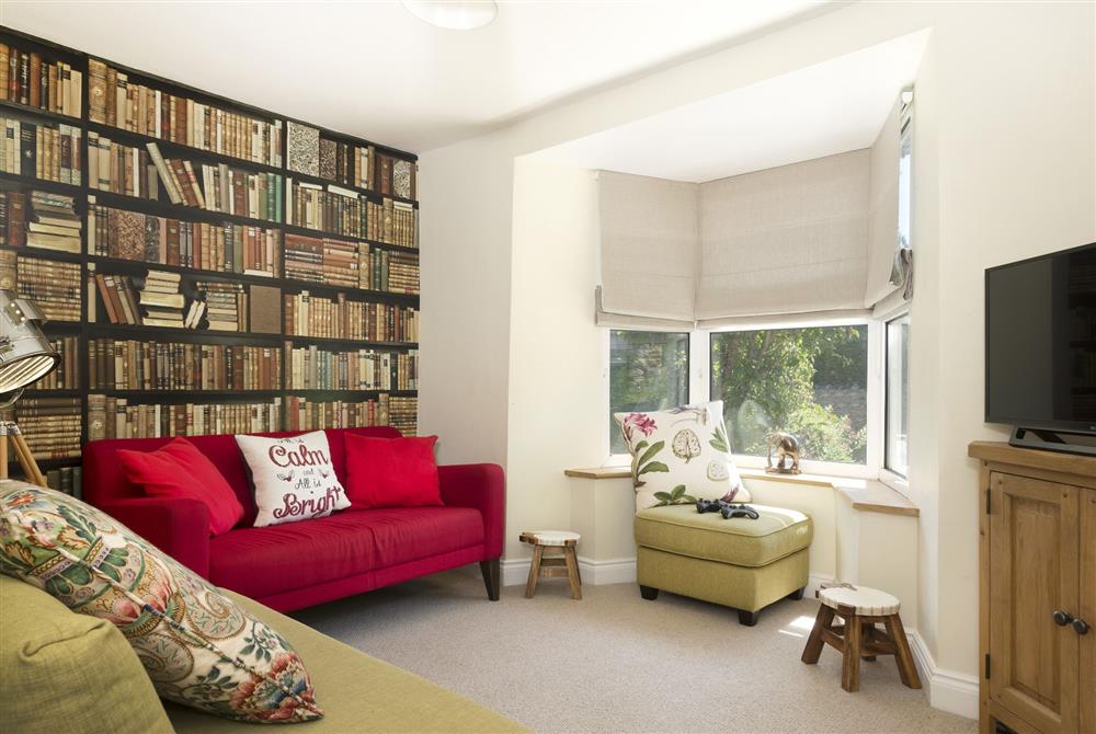 Snug room with LCD television with Netflix and DVD player.