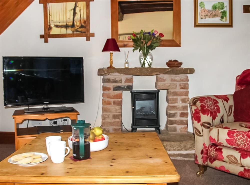 Living area (photo 2) at Millstone Cottage in Bridgnorth and Ironbridge, Shropshire