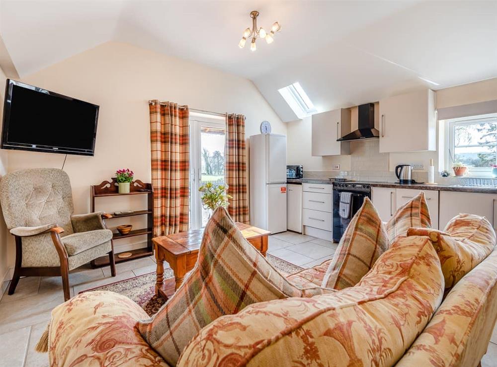 Open plan living space at Millstone Cottage in Westbury, near Shrewsbury, Shropshire