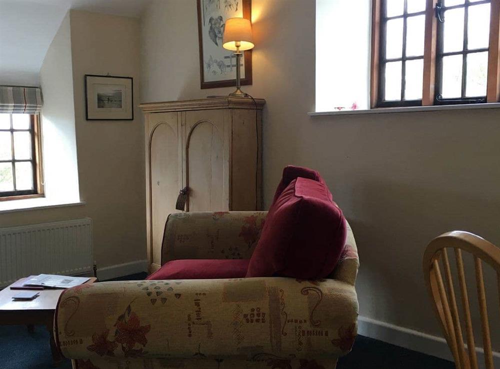 Living room/dining room at Millstones in Seatown, Chideock, Dorset
