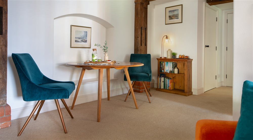 The table for two in the open-plan area at Millstream in Burnham-overy-staithe, Norfolk
