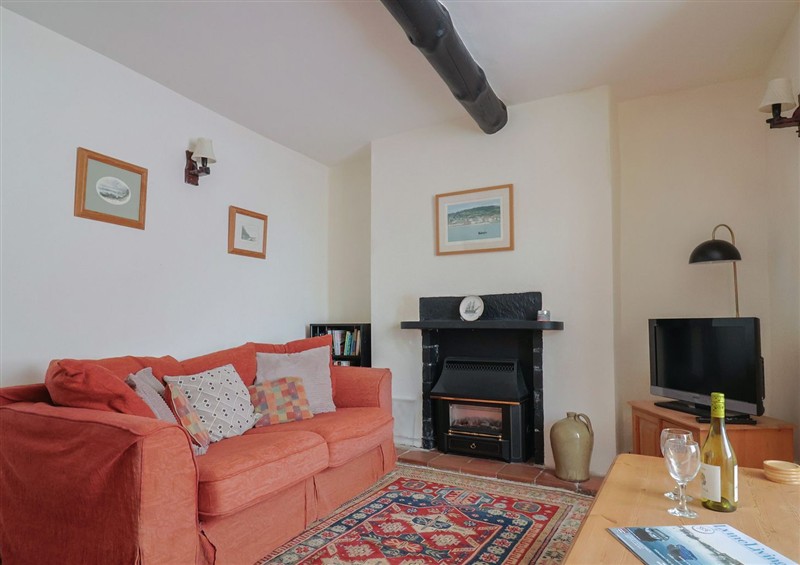 Relax in the living area at Milton Cottage, Lyme Regis