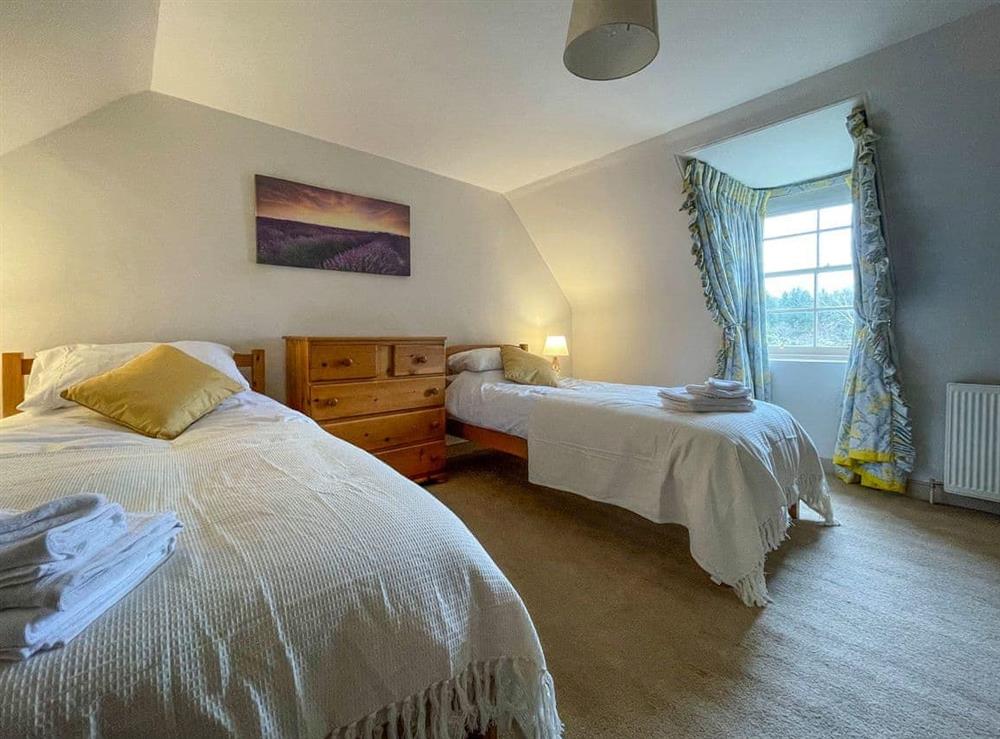 Twin bedroom at Milton Cottage in Rosehall, near Lairg, Sutherland