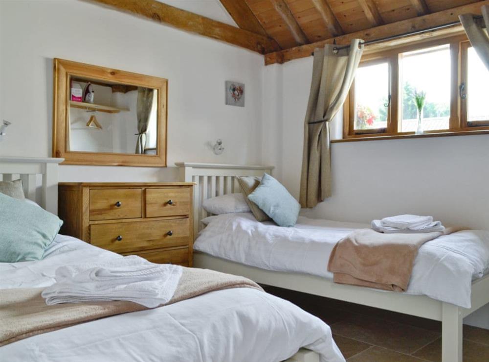 Light and airy twin bedroom at The Old Parlour, 