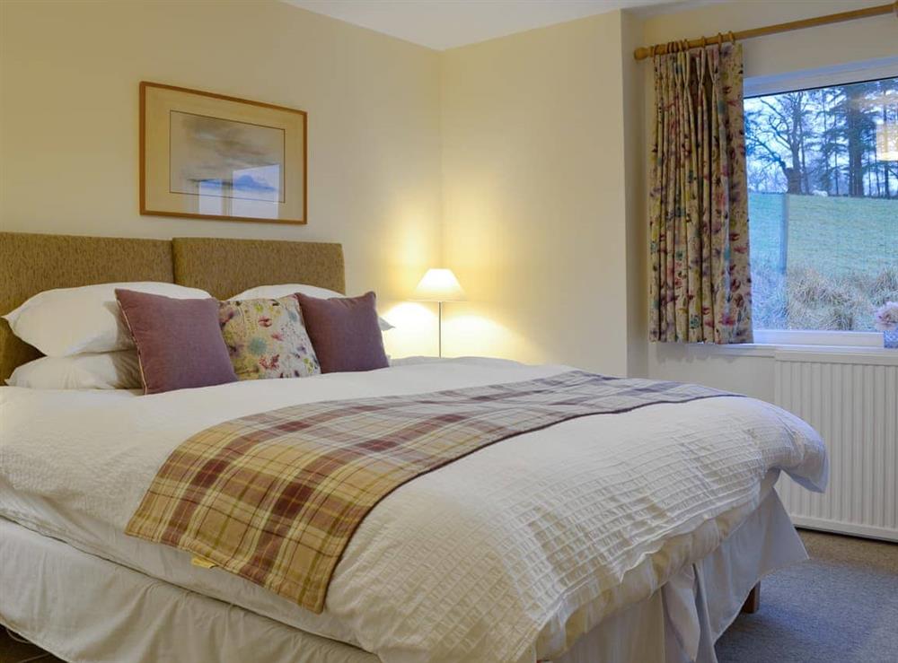 Double bedroom (photo 5) at Milton of Drimmie Farmhouse in Bridge of Cally, near Blairgowrie, Perthshire