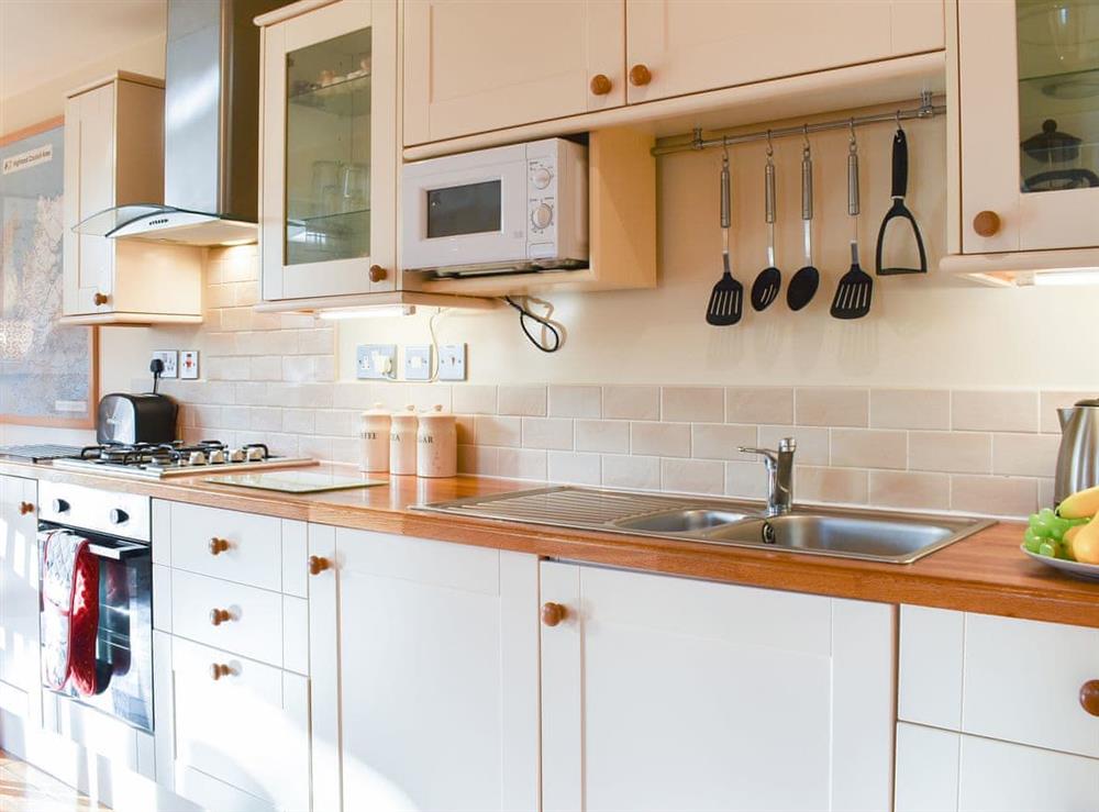 Well fitted and equipped kitchen at River Cottage, 