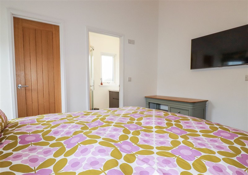 This is a bedroom (photo 3) at Minack Lodge, St Day