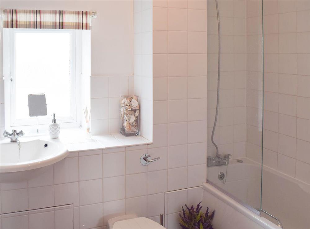 Lovely bathroom with shower over the bath at Mirabilis in Wroxham, near Norwich, Norfolk