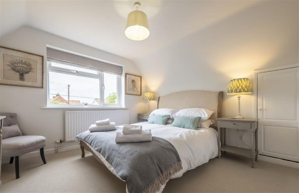 Master bedroom with King-size bed at Miramare Cottage, Holme-next-the-Sea near Hunstanton