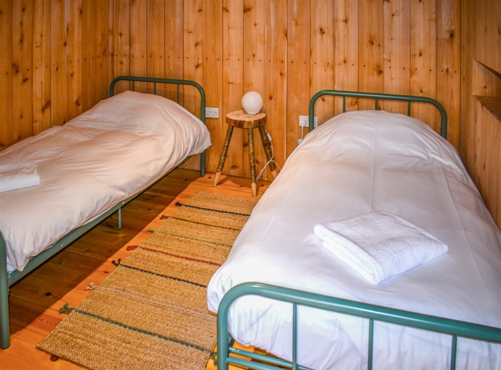 Twin bedroom at Mistle Roundhouse in Beaminster, Dorset