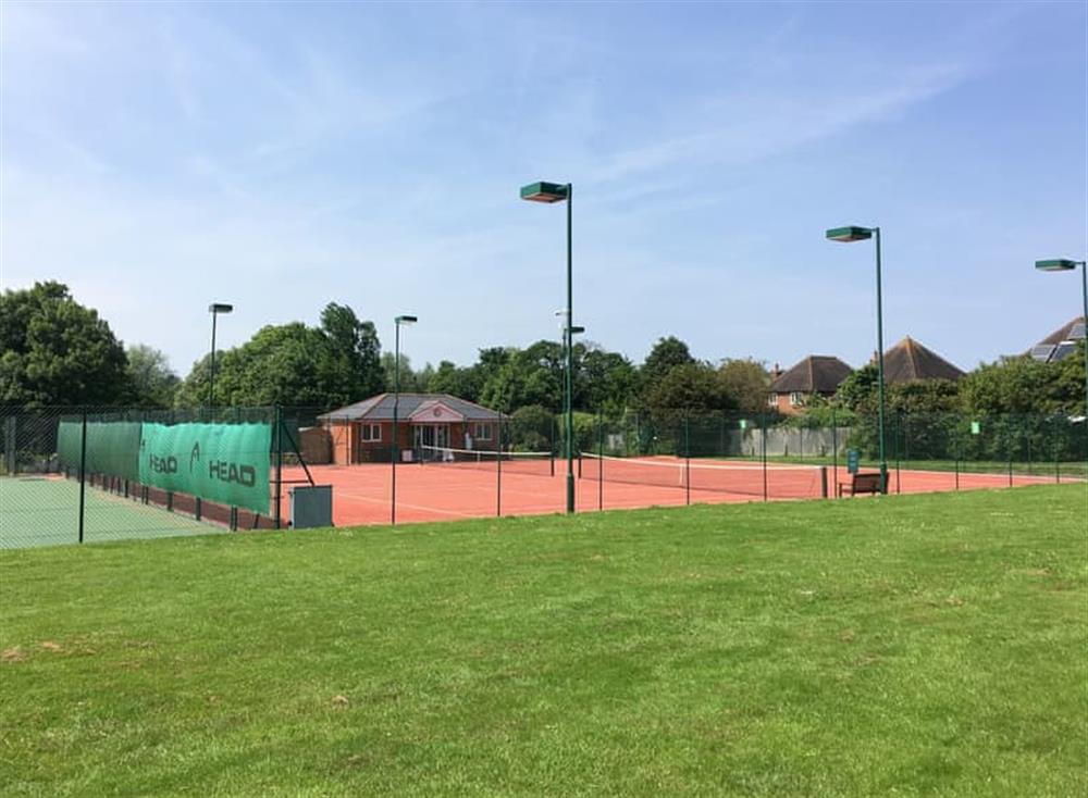 Tennis court at Mitford Lodge in Wye, Kent
