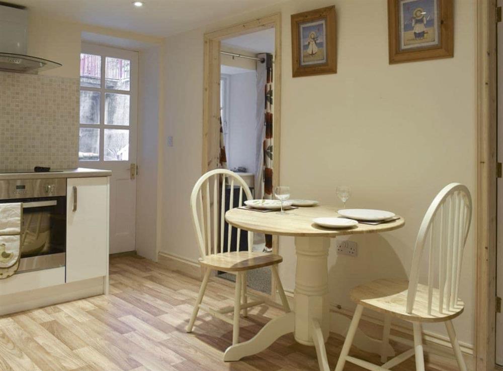 Intimate dining area within kitchen at Moby Dick Cottage in Whitby, North Yorkshire