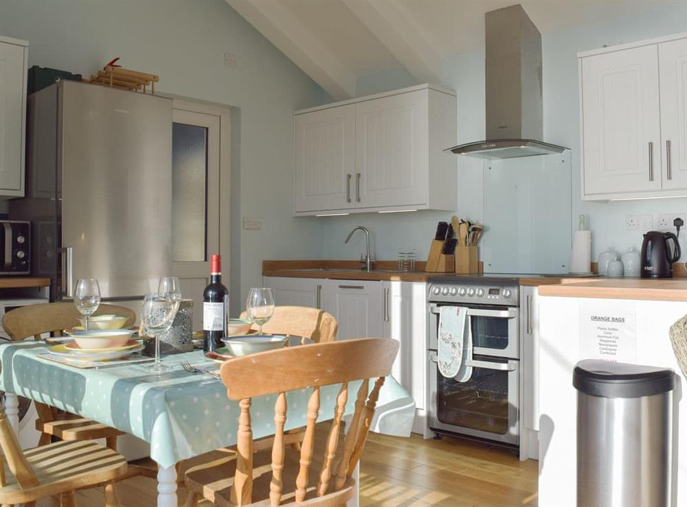 Well equipped kitchen/ dining area at Mole End in Amroth, near Saundersfoot, Pembrokeshire, Dyfed