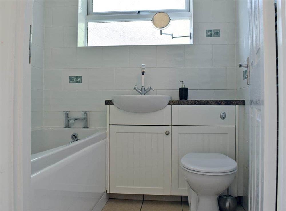 Bathroom with shower over bath at Moles Leap in Brading, Isle Of Wight