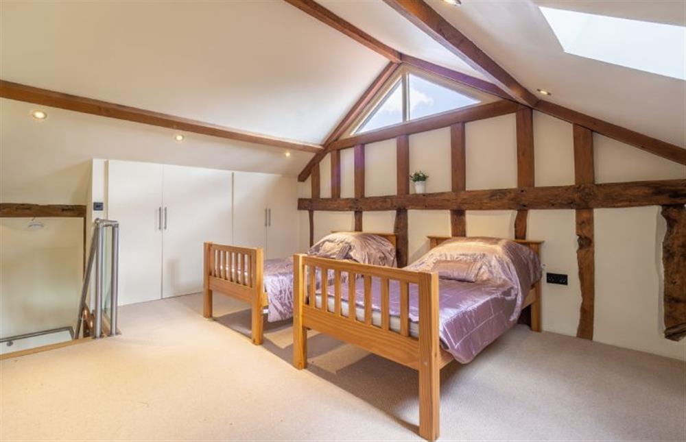 Bedroom two with twin 3’ single beds at Moles Meadow, Middleton 