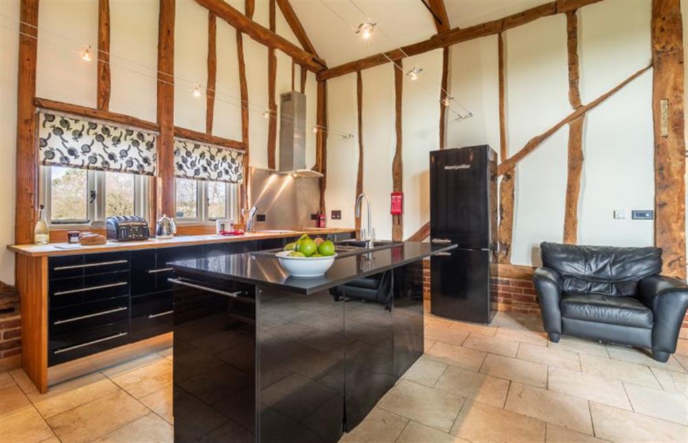 Well-equipped kitchen with Nespresso coffee machine and island at Moles Meadow, Middleton 