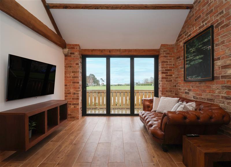Relax in the living area at Mollys Cottage, East Knapton near Rillington