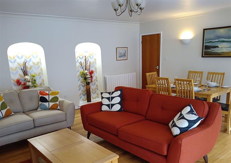 Relax in the living area at Mollys Cottage, Grasmere