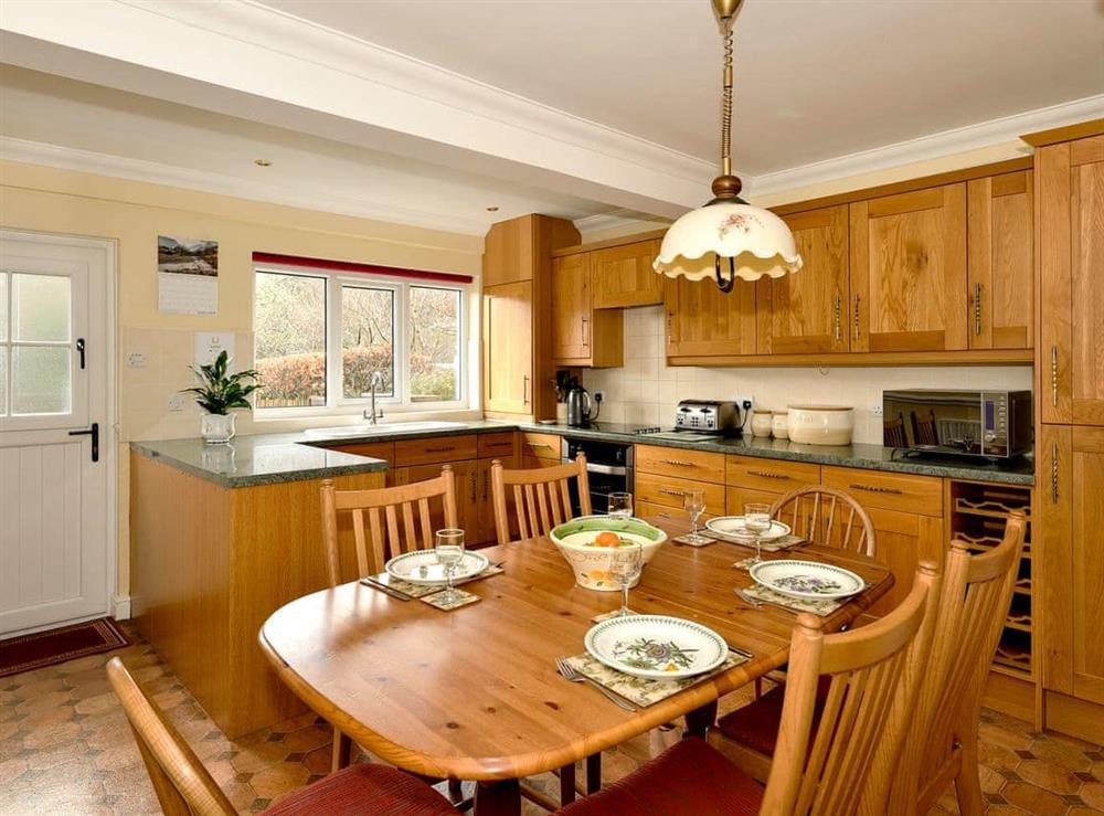 Kitchen and dining area at Mollys Cottage in Penrith, Cumbria