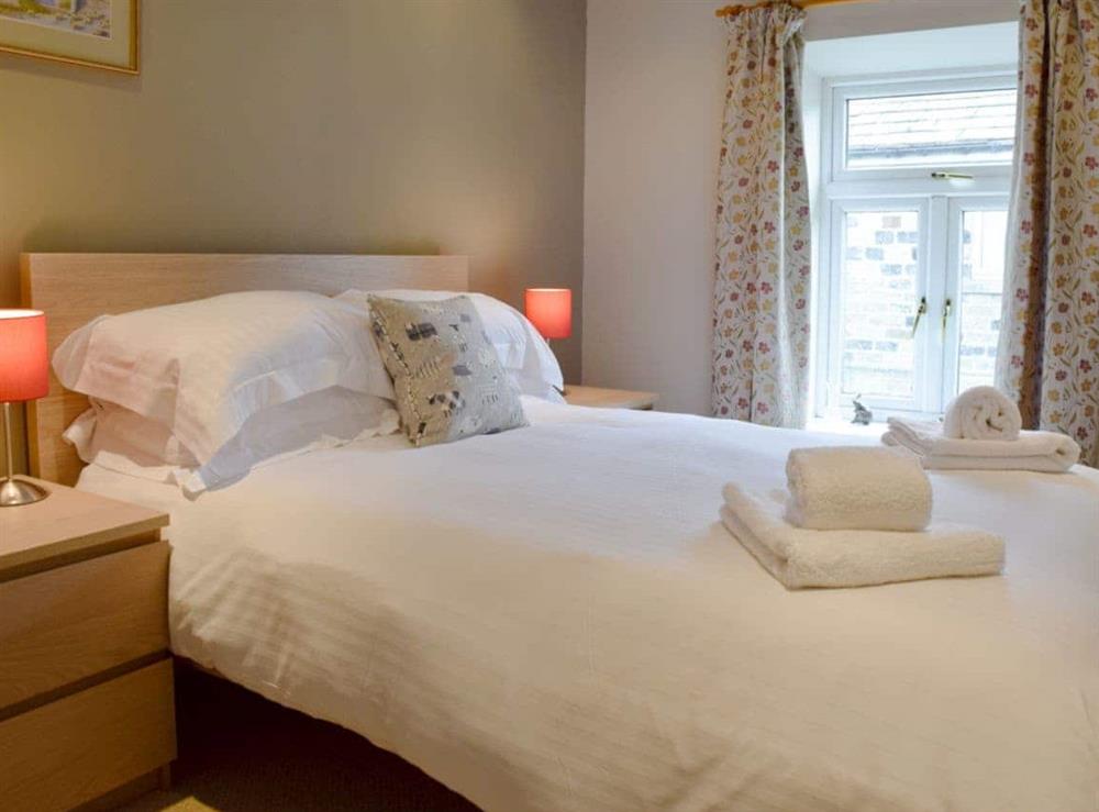 comfy double bedroom at Monkey Cottage in Grassington, North Yorkshire