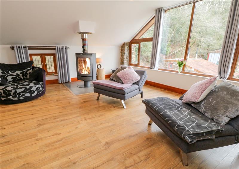 Relax in the living area at Monkleigh Mill, Monkleigh near Bideford
