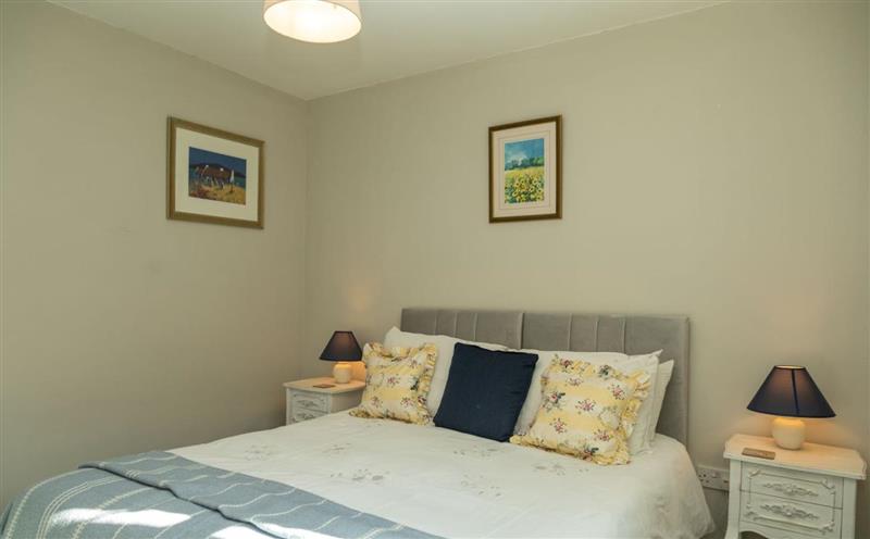 This is the bedroom at Monks Cleeve Bungalow, Exford