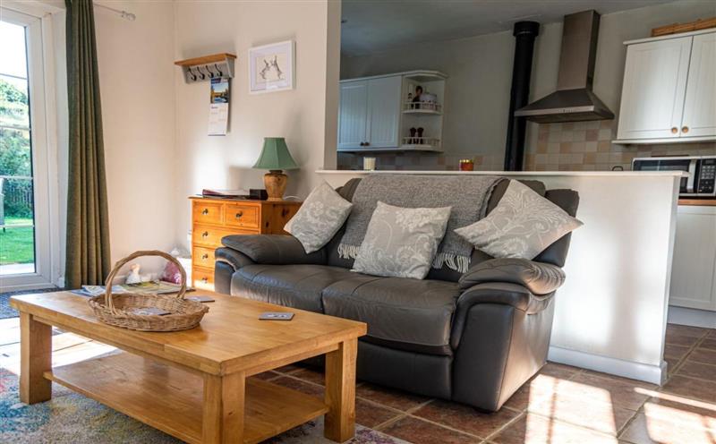 This is the living room at Monks Cleeve Bungalow, Exford